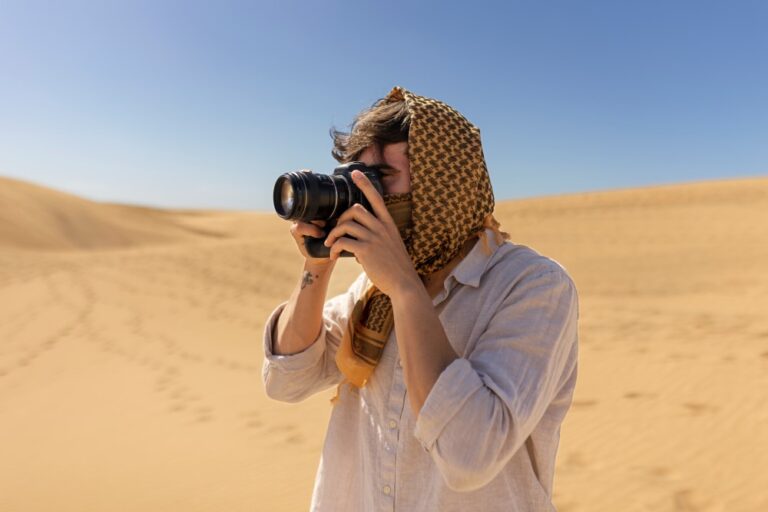 side-view-man-taking-photos-with-camera