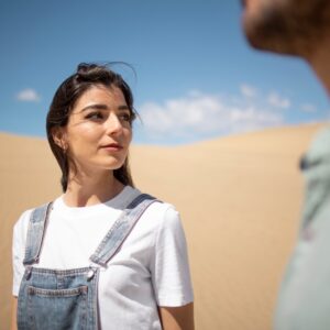 Side view smiley couple enjoying Morning Desert Safari Dubai