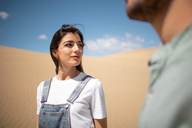 Side view smiley couple enjoying Morning Desert Safari Dubai