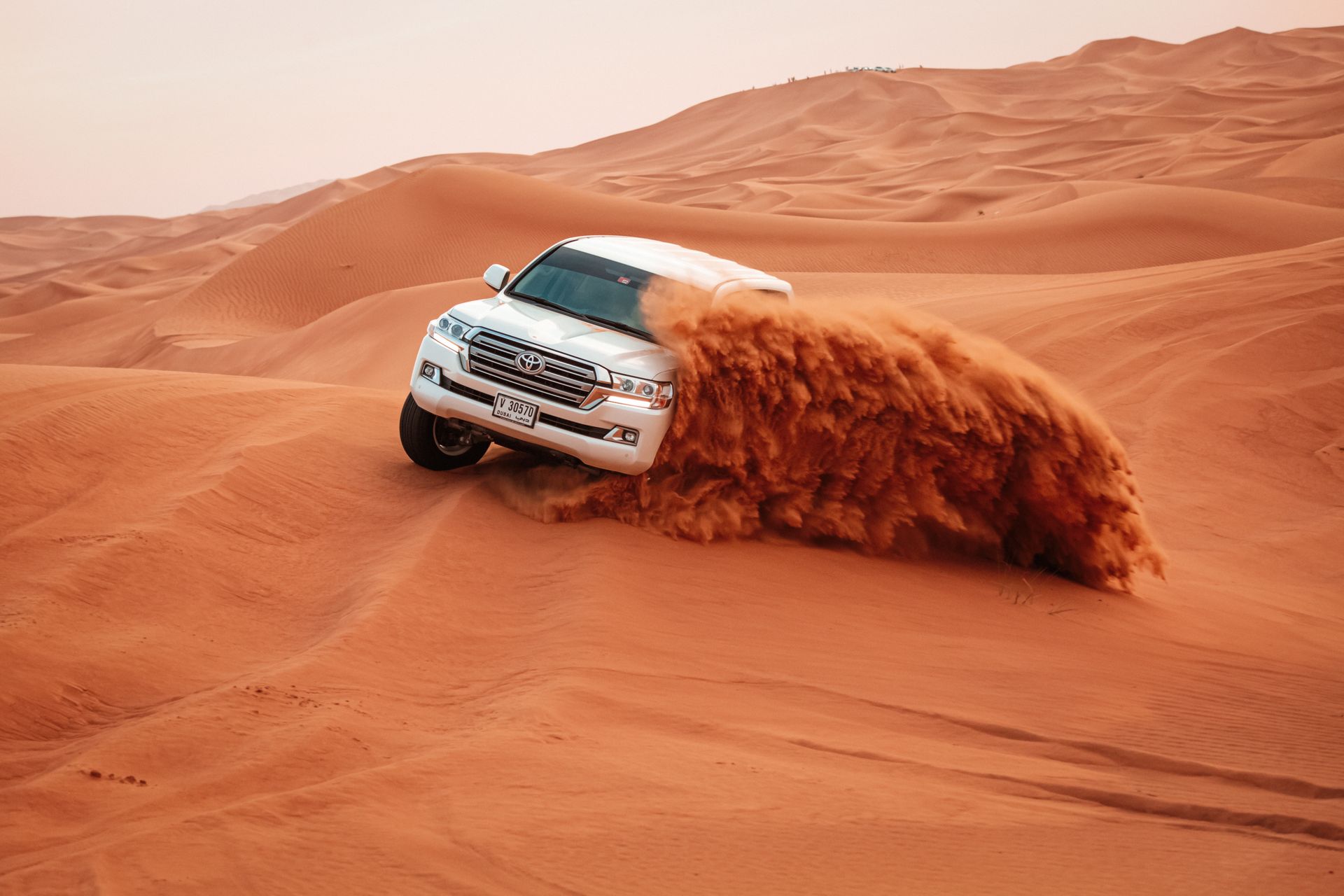 VIP Desert Safari dubai tour on a land cruiser with Dune Bashing on arabian red dunes by VIP Desert Tour